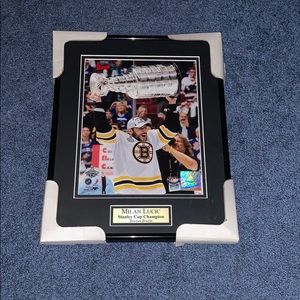 Framed Milan Lucic picture.